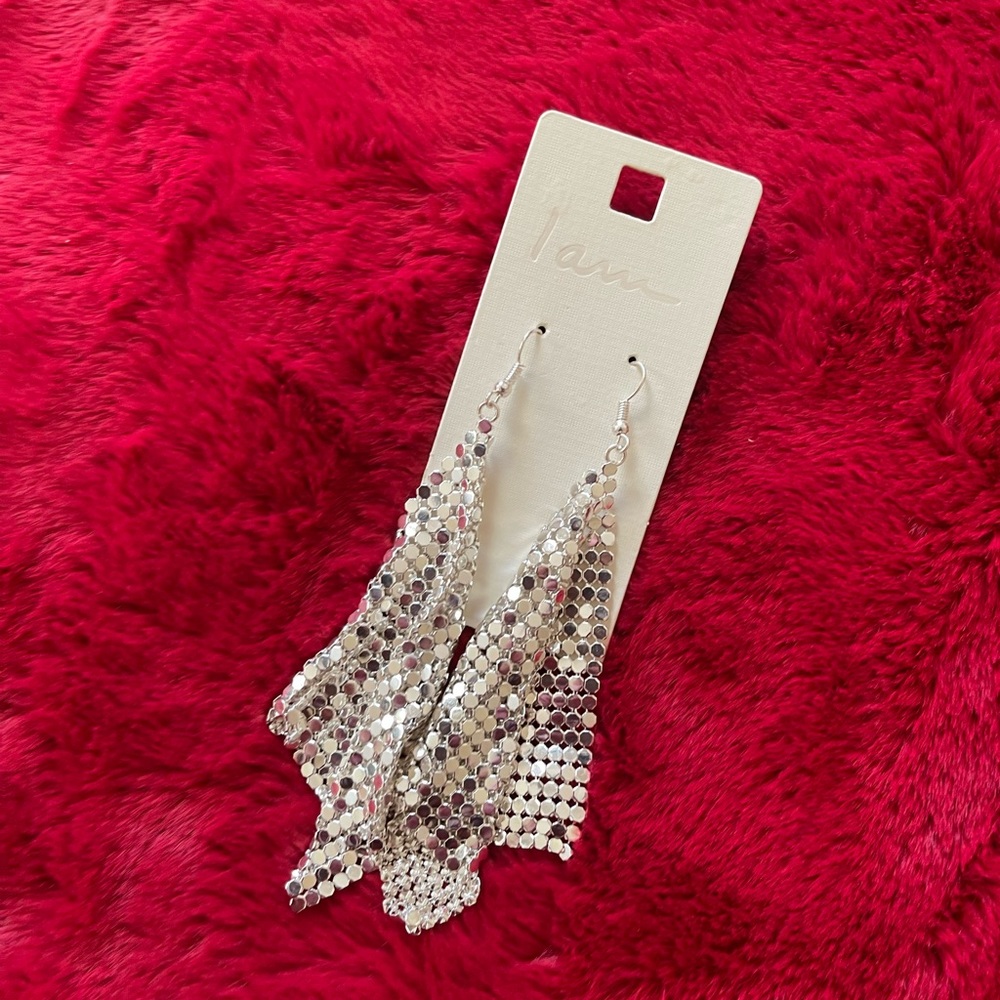 Beautiful silver dangling holiday earrings